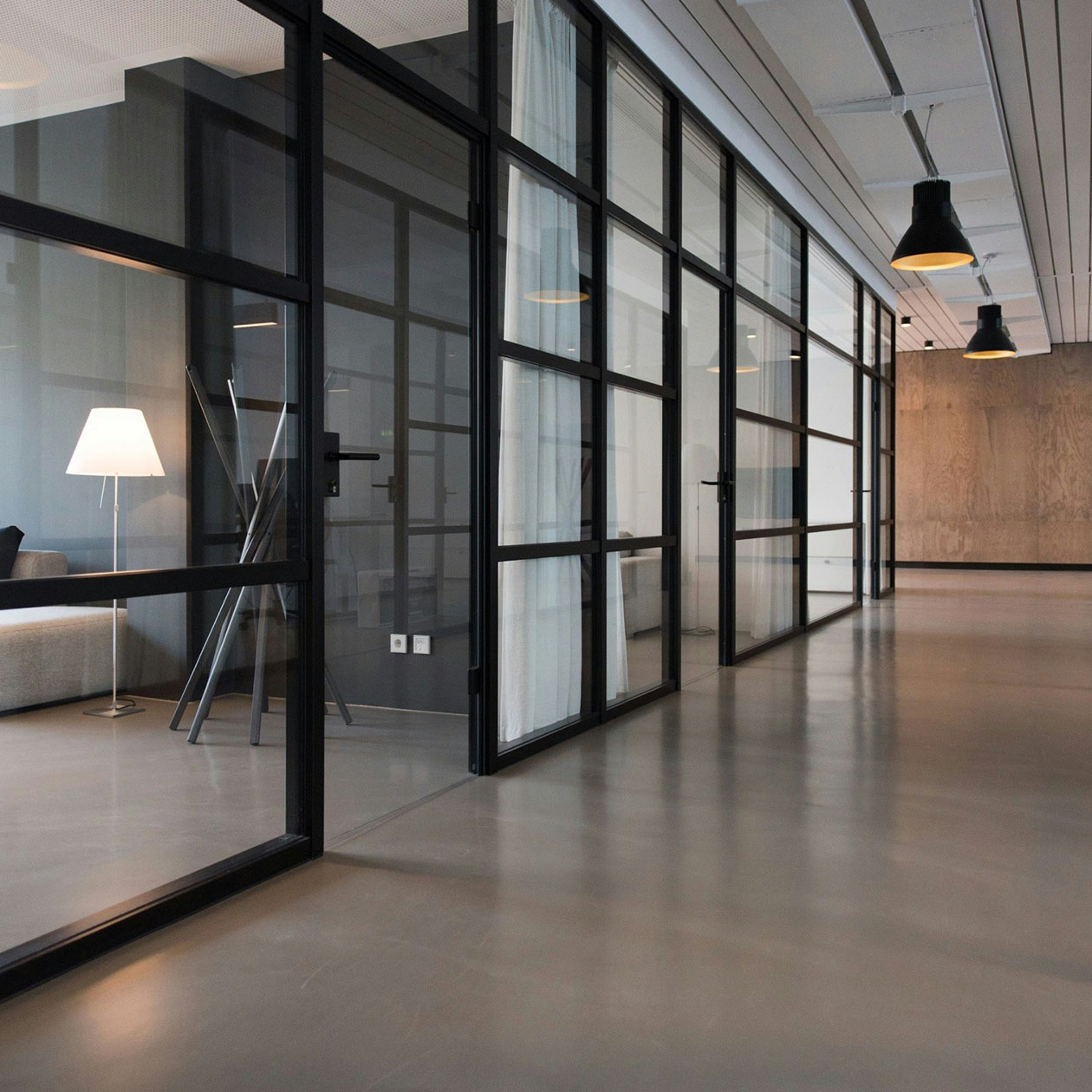 Placeholder image of an office space with large glass doors